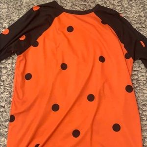 Girl’s LuLaRoe Black and Orange Polka Dot Randy